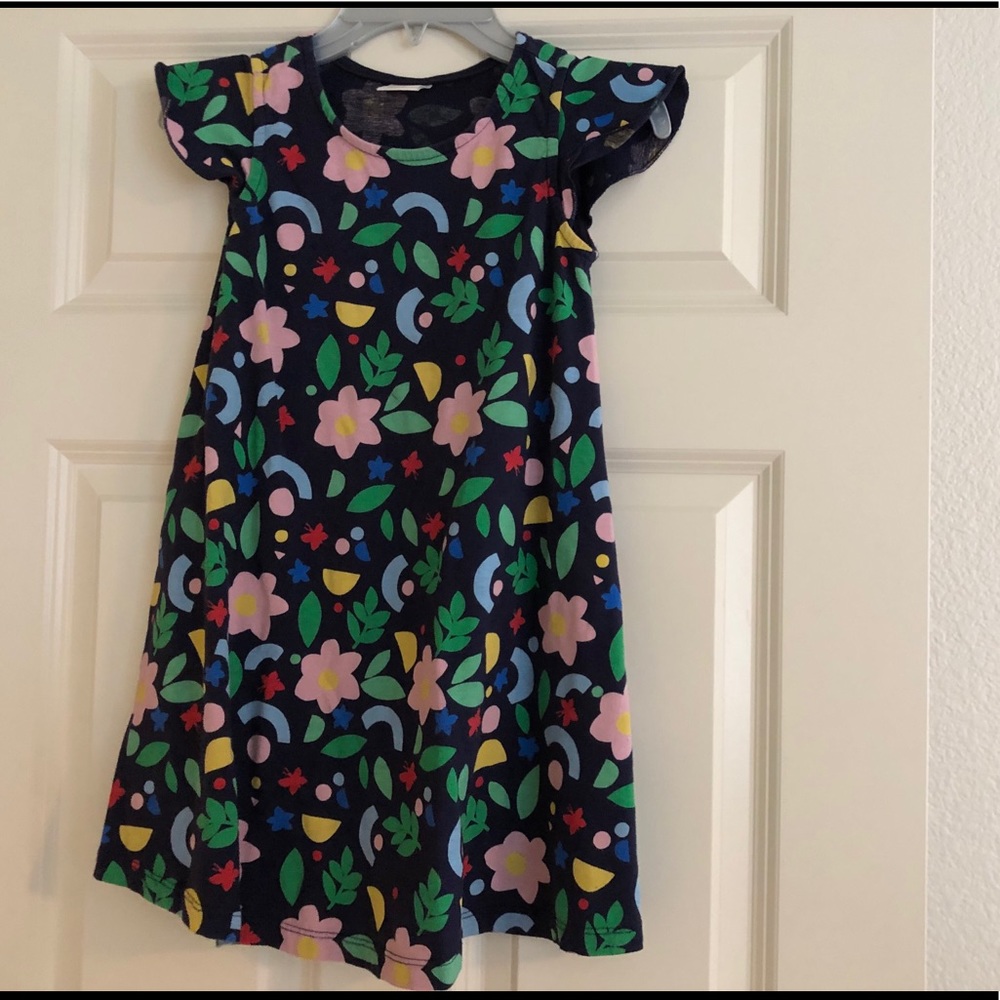 Girls navy dress with multi colored flowers
